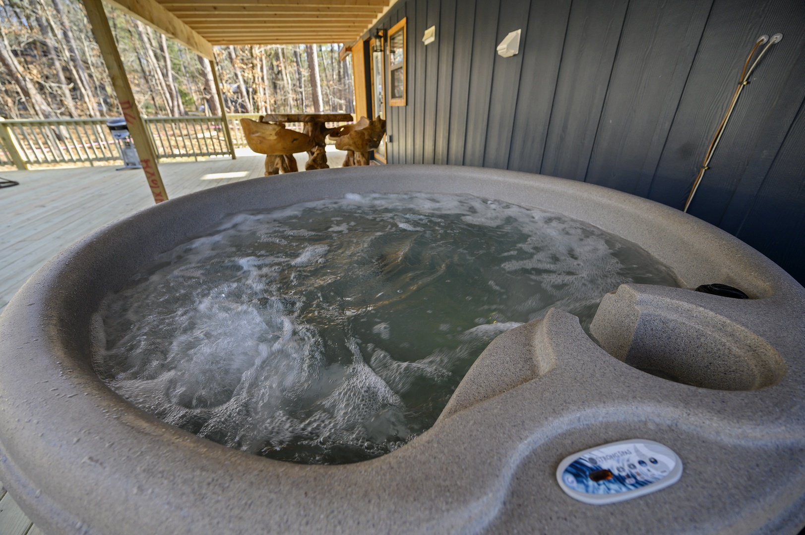 enjoy the hot tub under the covered part of the deck